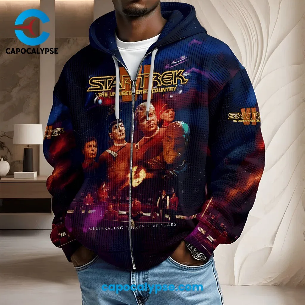 Star Trek The Undiscovered Country 35th Anniversary Hoodie 5 Star Trek The Undiscovered Country anniversary hoodie featuring original cast in red Starfleet uniforms against purple and blue space backdrop