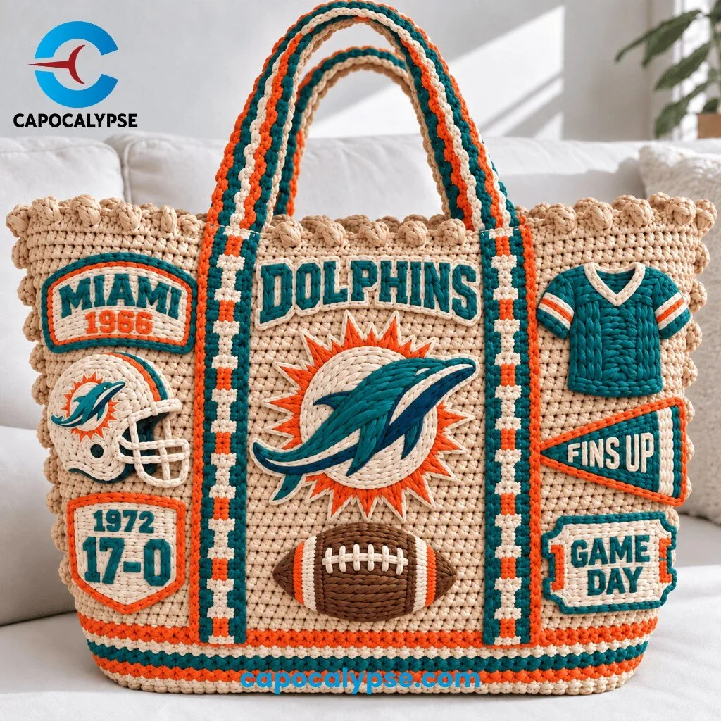 Miami Dolphins Crochet Tote Bag 3 Miami Dolphins crochet tote bag featuring cream knit body with teal embroidered jumping dolphin logo, Miami 1966 patch, helmet, 1972 17-0 undefeated season, and Fins Up Game Day text, with teal and orange stripe twisted handles